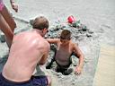 P1010063.jpg: Sean and Matt digging a hole at the beach